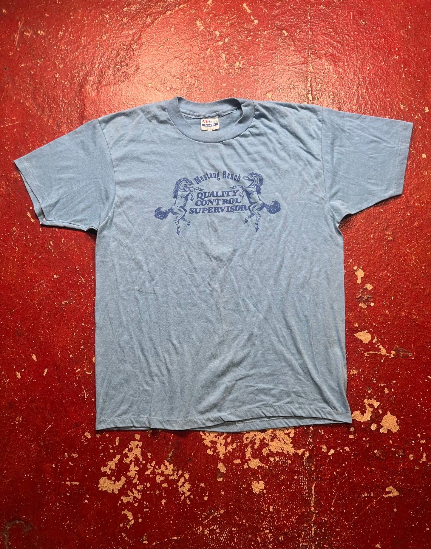 1983 Mustang Ranch “Quality Control Supervisor” Tee