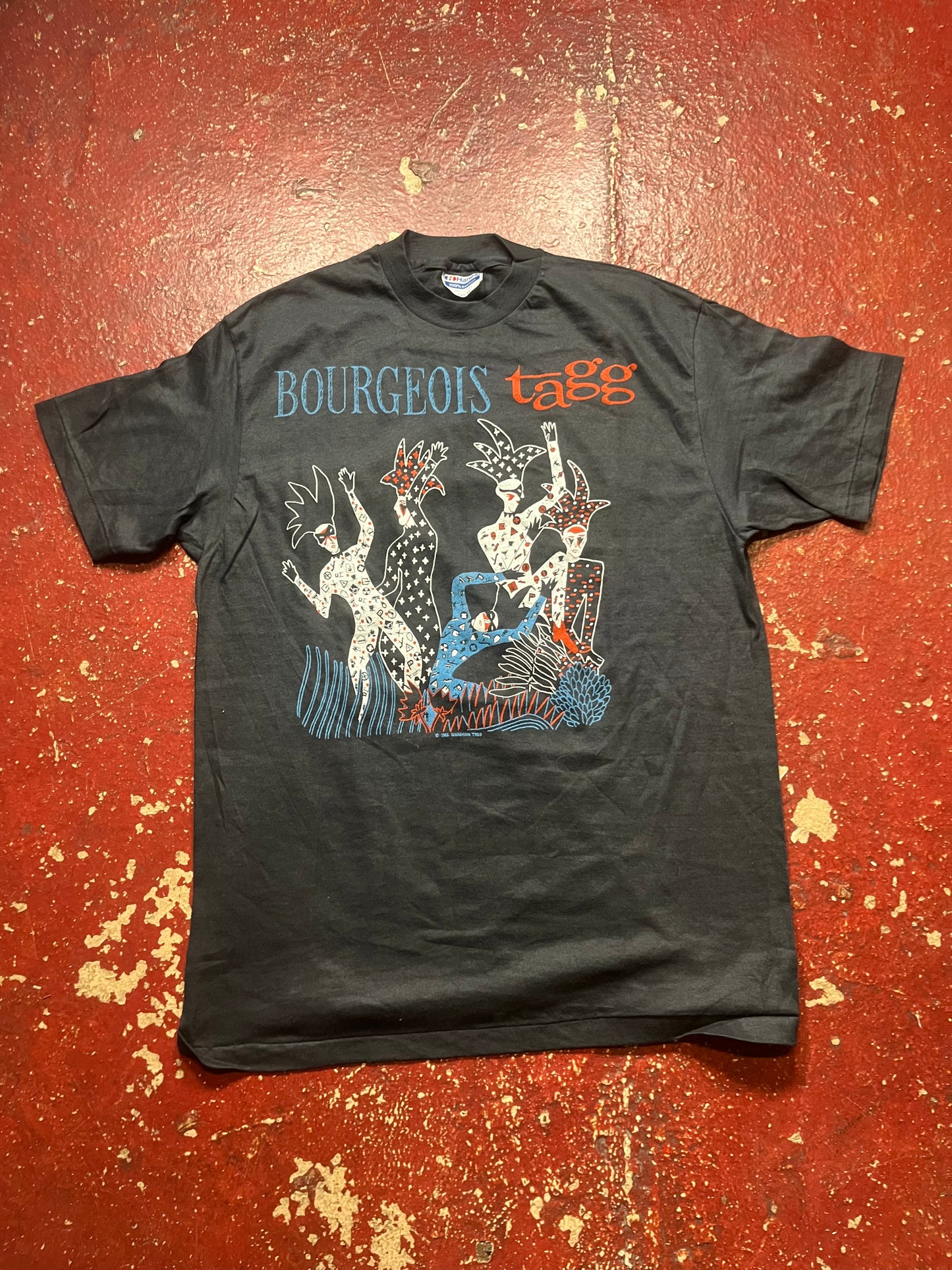 1986 Bourgeois Tagg Tee