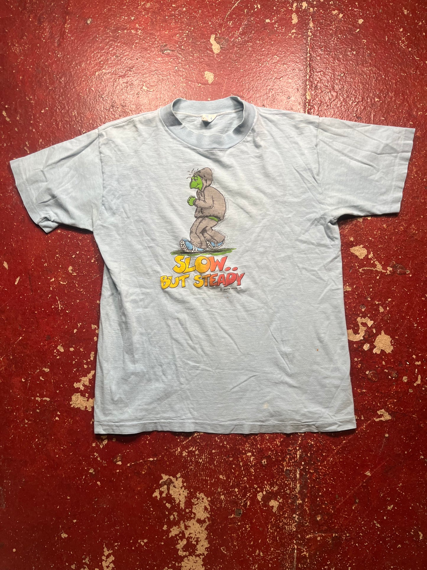 70s Slow But Steady Tee